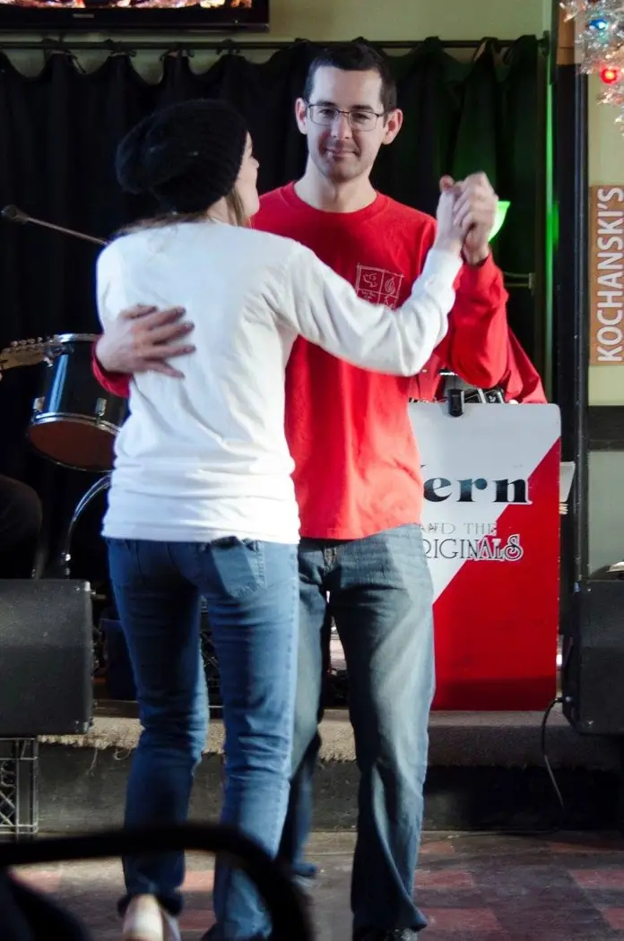 Guests dancing in front of the musicians at Kochanski’s during Santa Rampage 2015